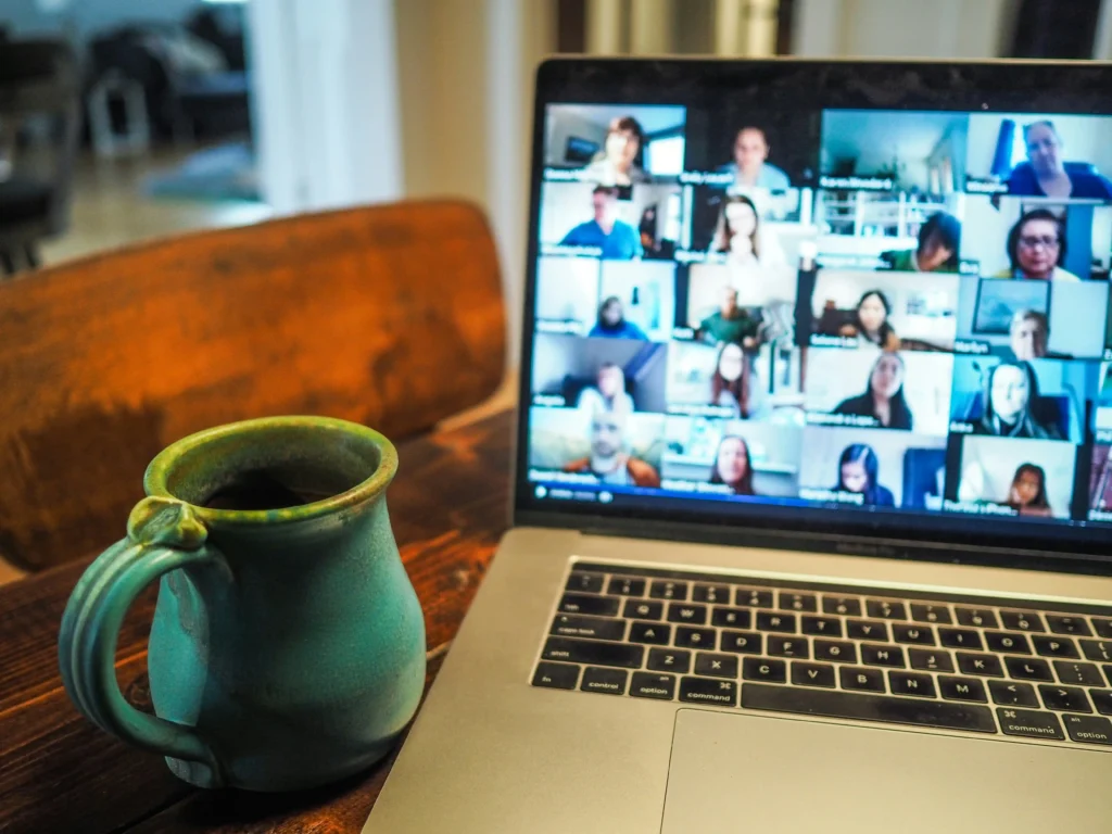 A company meeting held over video conference using effective business communication.